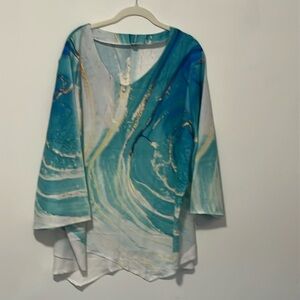 Multicolor, blue turquoise and beige top,length sleeves, v-neck. 
Size 3XL